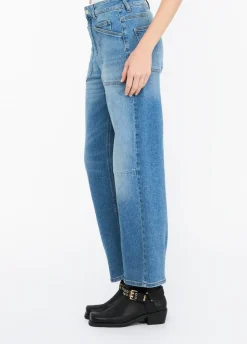 Pantaloni carrot fit a vita alta