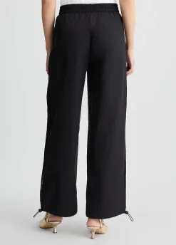 Pantaloni con inserto in rete
