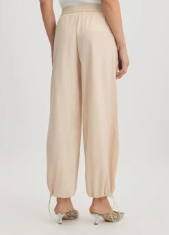 Pantaloni con inserto in rete