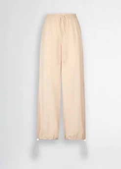 Pantaloni con inserto in rete