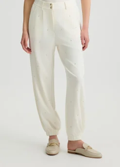 Pantaloni con logo e strass
