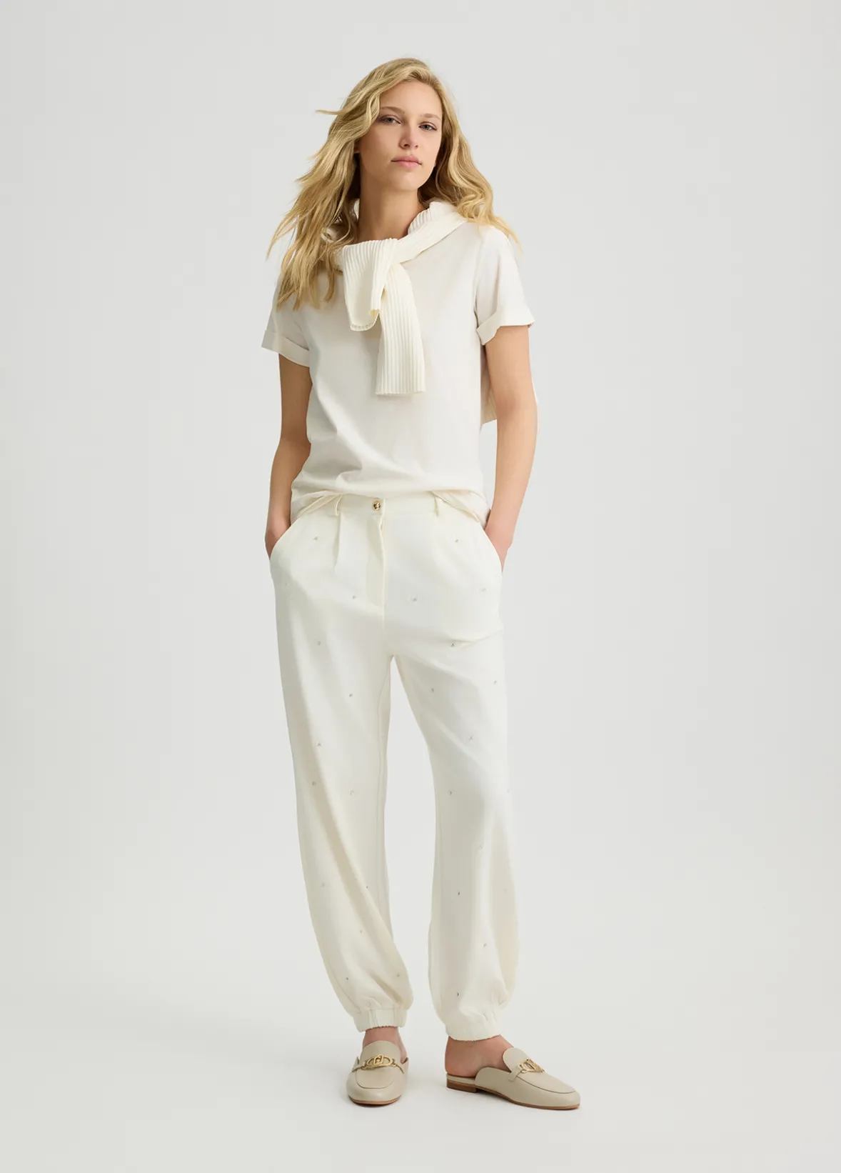 Pantaloni con logo e strass