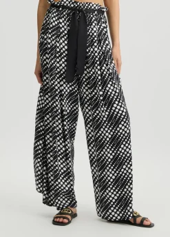 Pantaloni con stampa a pois