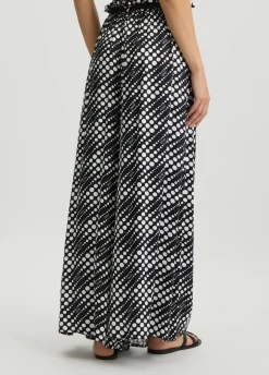 Pantaloni con stampa a pois