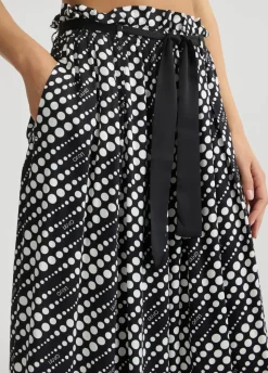 Pantaloni con stampa a pois