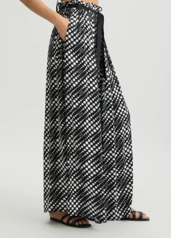 Pantaloni con stampa a pois