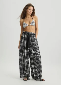 Pantaloni con stampa a pois