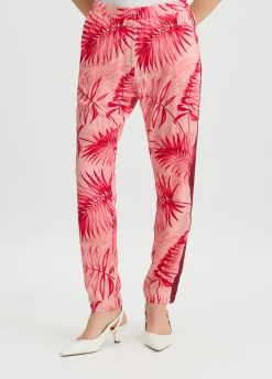 Pantaloni con stampa palme