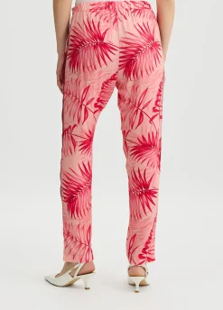 Pantaloni con stampa palme