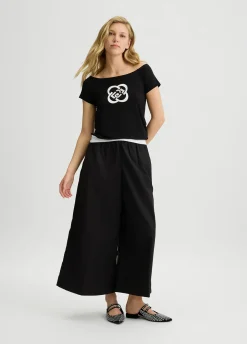 Pantaloni cropped a palazzo