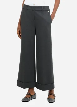 Pantaloni cropped con piega