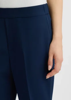 Pantaloni cropped con piega