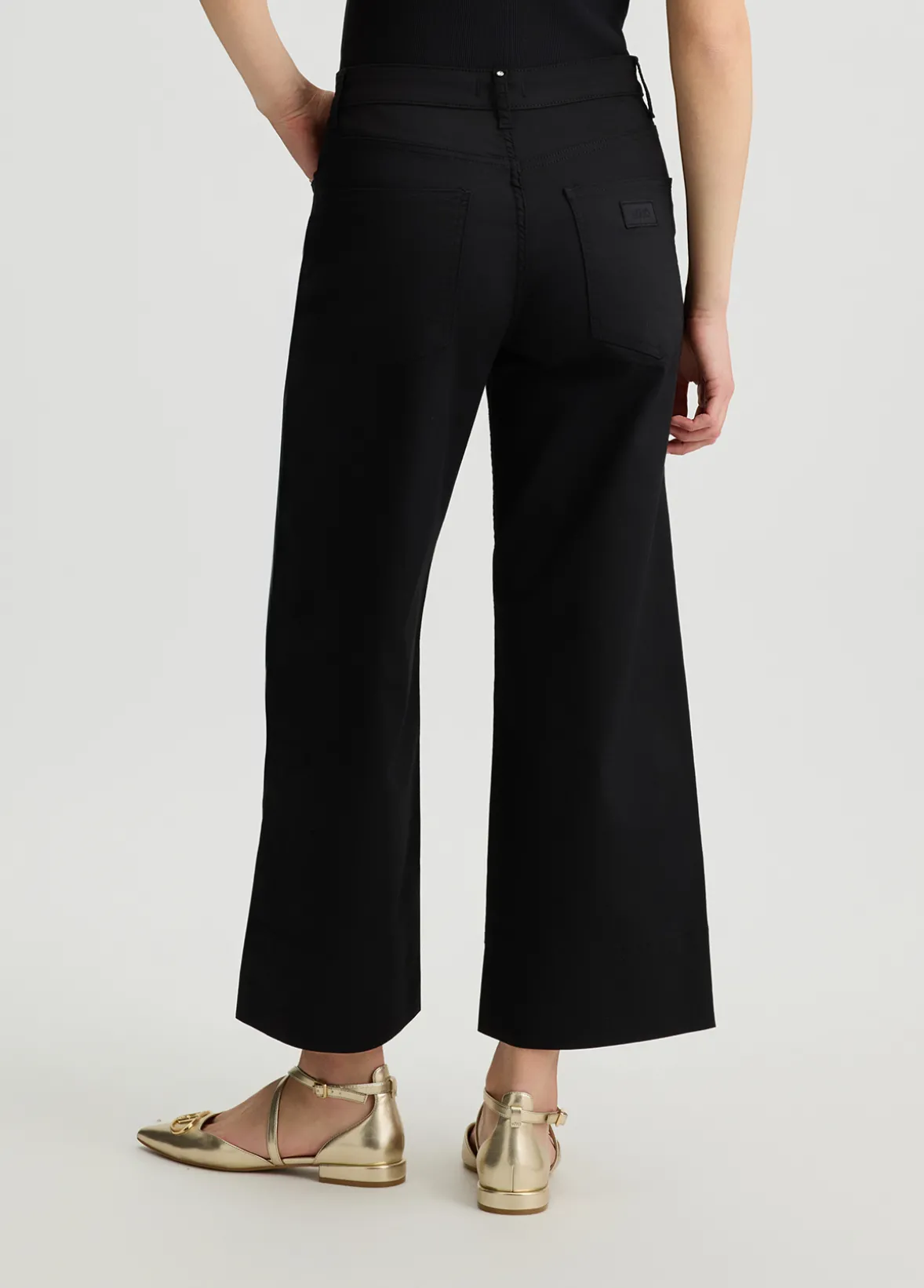 Pantaloni flare a vita alta