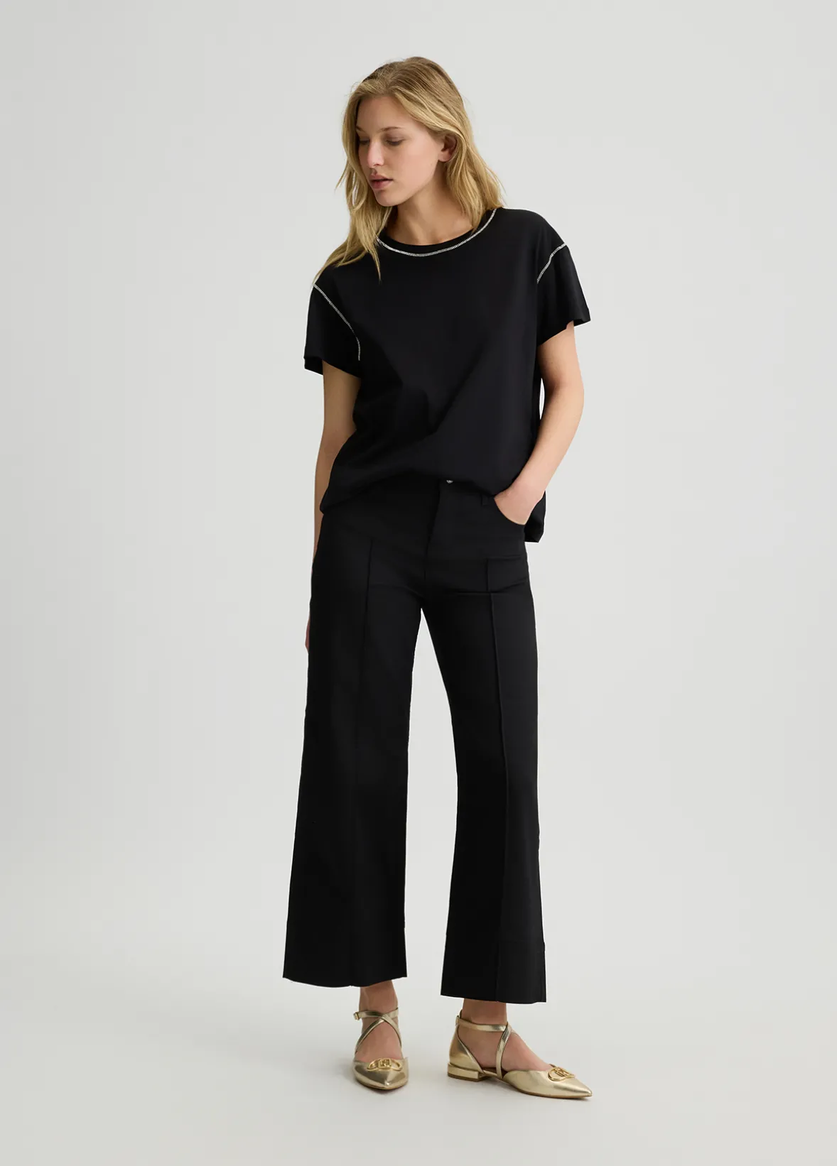 Pantaloni flare a vita alta