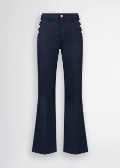 Pantaloni flare con bottoni
