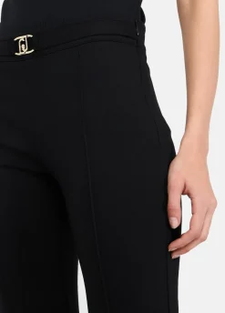 Pantaloni flare con cintura