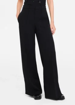 Pantaloni flare con spacchetti