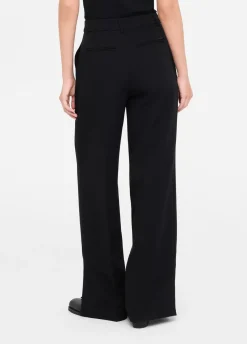 Pantaloni flare con spacchetti