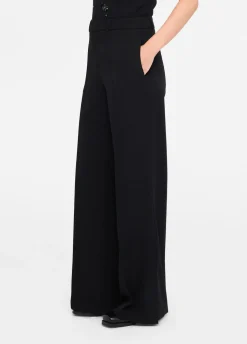Pantaloni flare con spacchetti