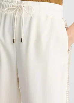 Pantaloni jogging con paillettes