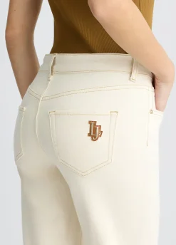 Pantaloni straight con patch logo