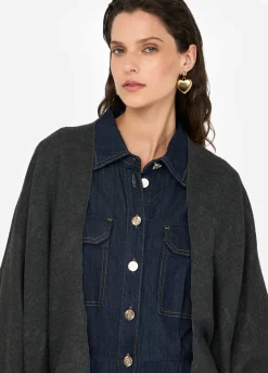 Poncho con logo e frange
