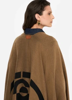 Poncho con logo e frange