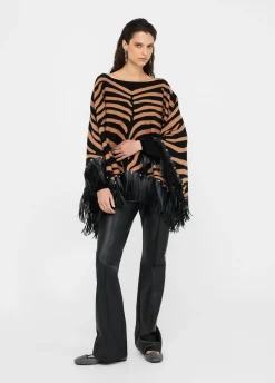 Poncho zebrato con frange