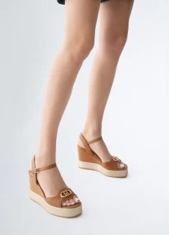 Sandali zeppa in pelle