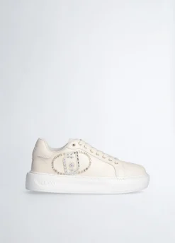 Sneakers con logo gioiello