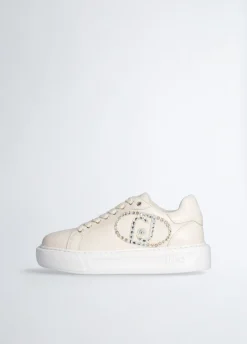 Sneakers con logo gioiello