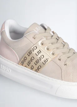 Sneakers con logo traforato