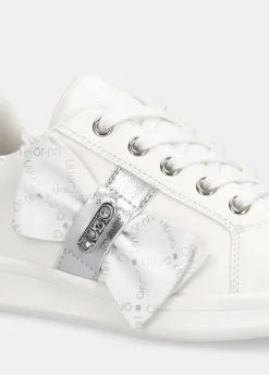 Sneakers con maxi fiocco