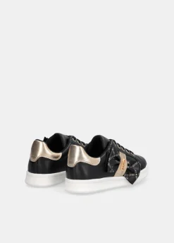 Sneakers con maxi fiocco