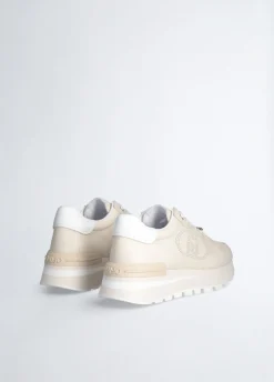 Sneakers in pelle con logo traforato