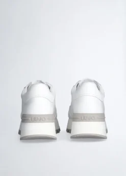 Sneakers in pelle con logo traforato