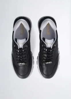 Sneakers in pelle con logo traforato