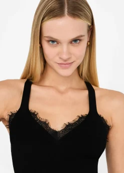 Top con pizzo