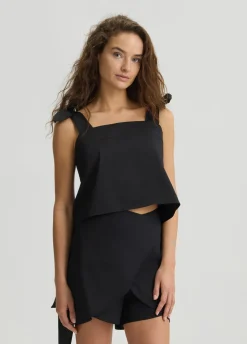 Top in cotone con fiocchetti