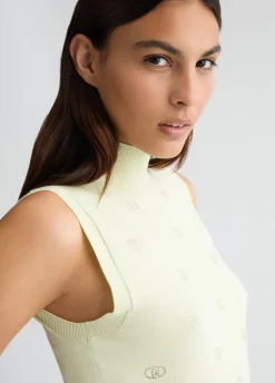 Top in maglia con logo e strass