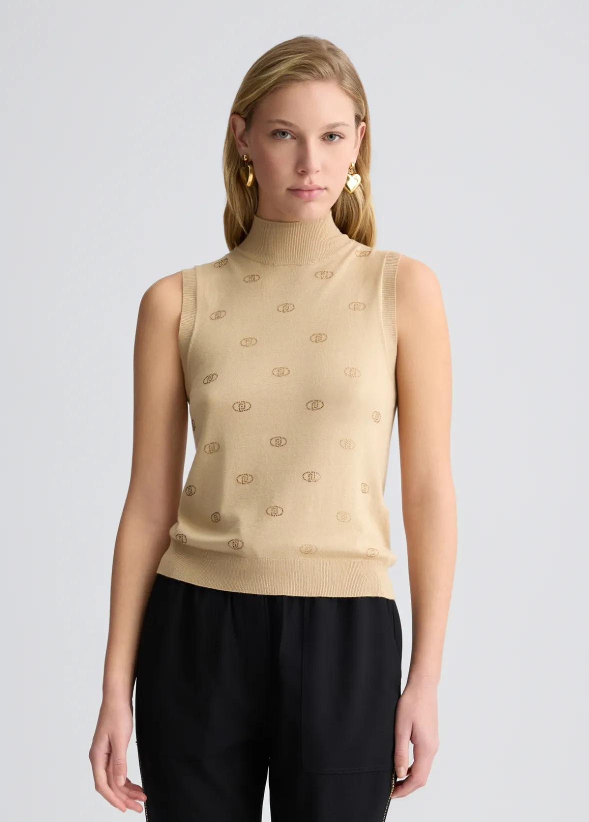 Top in maglia con logo e strass