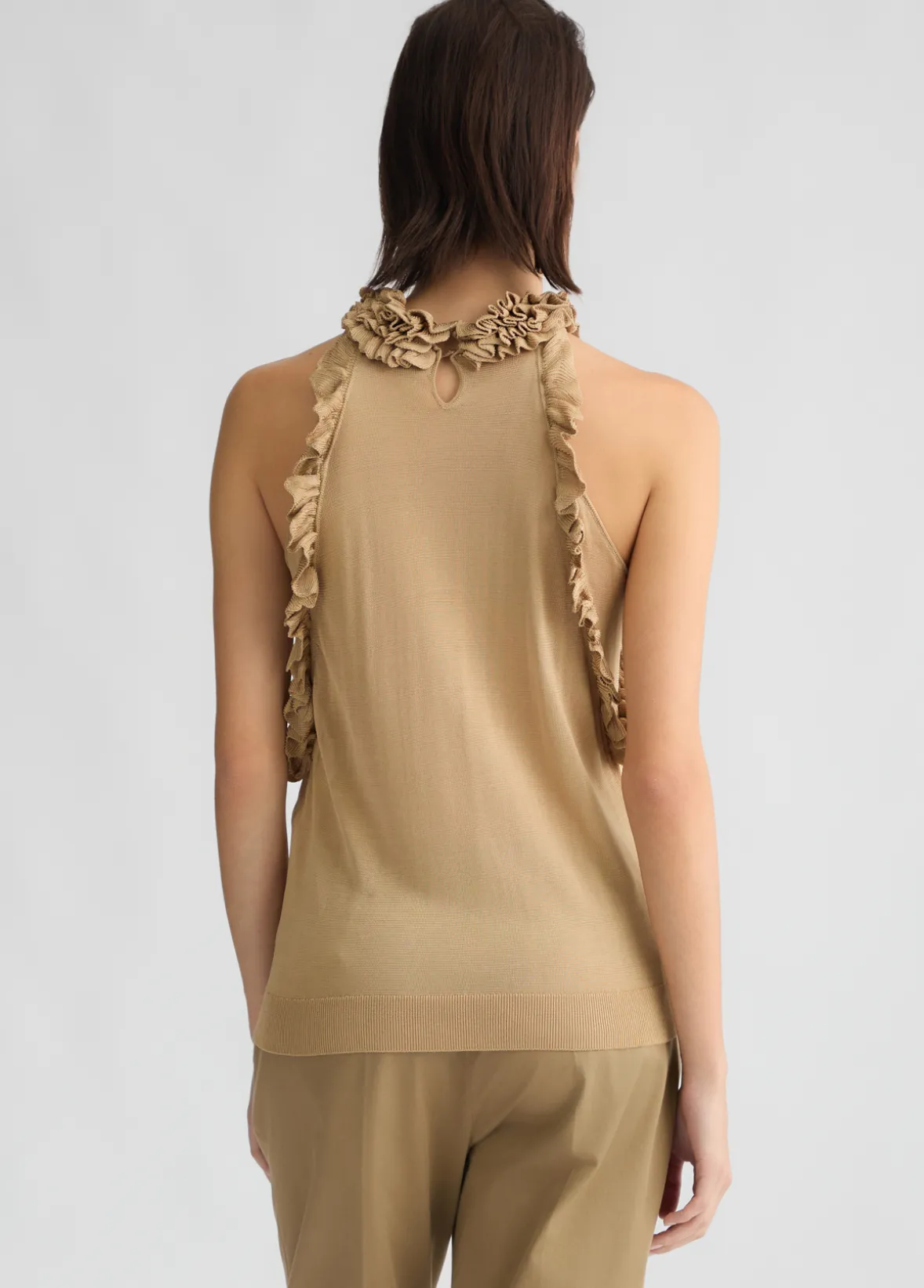 Top in maglia con rouches