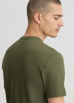 T-shirt con bottoni