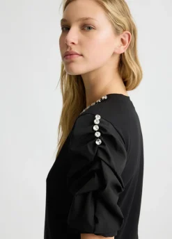 T-shirt con castoni gioiello