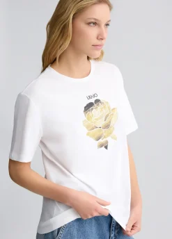 T-shirt con fiore e strass