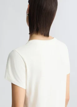 T-shirt con logo e strass
