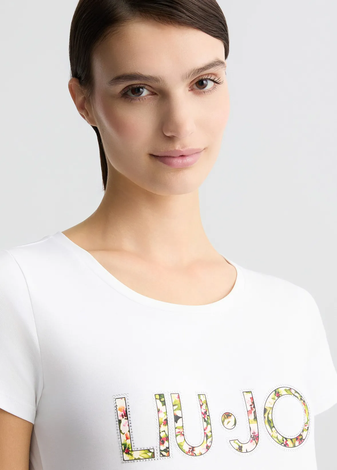 T-shirt con logo e strass