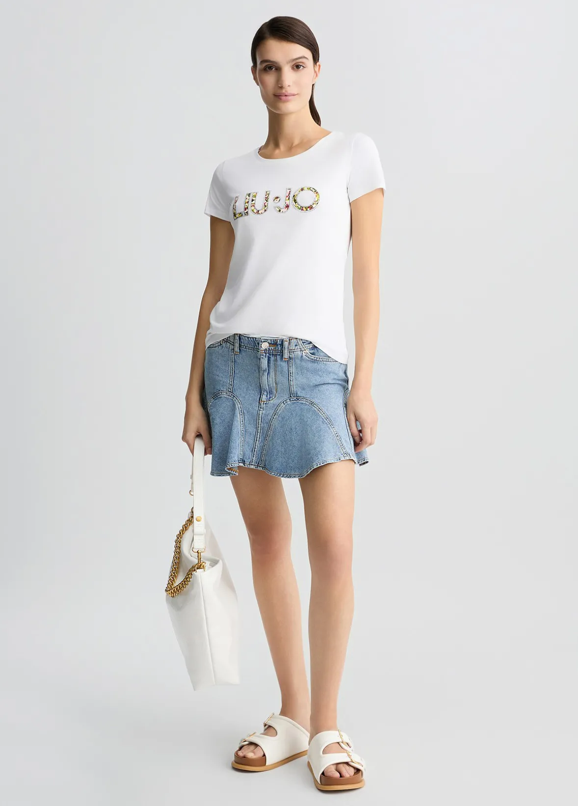 T-shirt con logo e strass