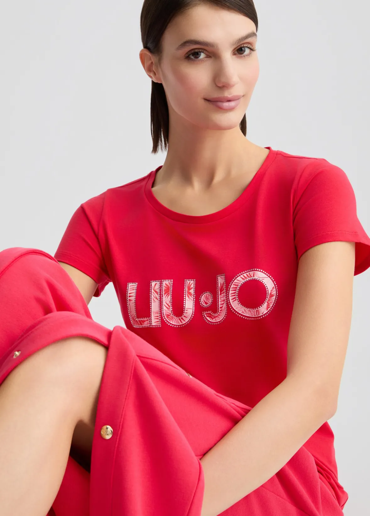 T-shirt con logo e strass