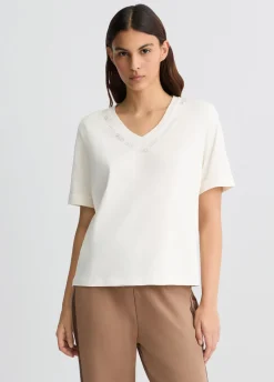 T-shirt con logo e strass